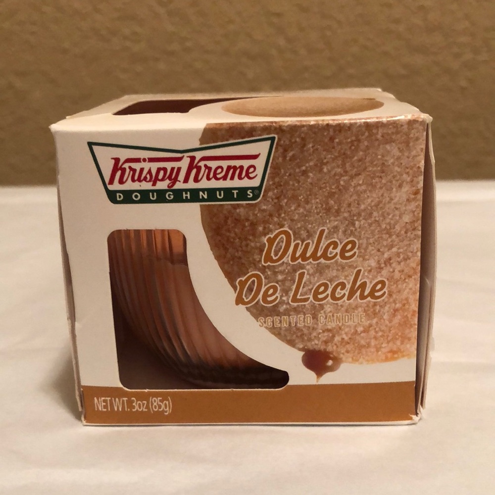 NIB Krispy Kreme Dulce De Leche Scented Candle. Box has minor discolorations.